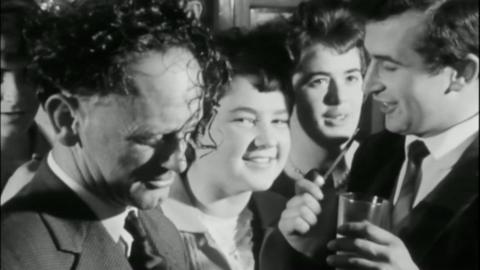 men and women celebrating Hen Galan in a black and white photo