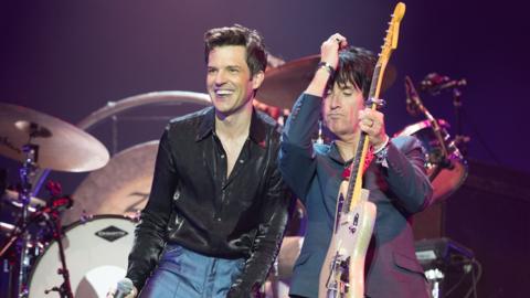 The Killers performing on the Pyramid Stage at Glastonbury Festival 2019 with Johnny Marr