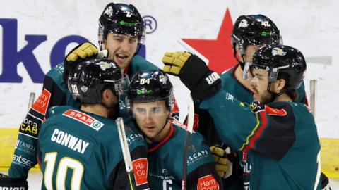 Giants players celebrate scoring against Fife