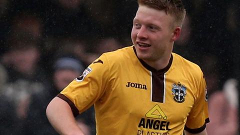 Tommy Wright in action for Sutton