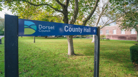 A sign outside Dorset Council County Hall
