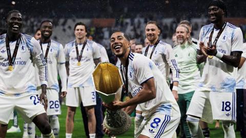 Youri Tielemans of Aston Villa FC lifts the trophy during the award ceremony following the UEFA Europa League final