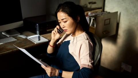 Woman paying bill