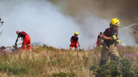 Firefighters tackling the blaze at Headon Warren.