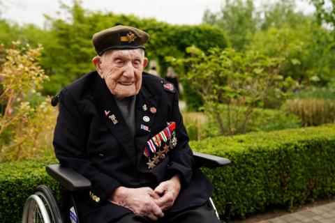 Donald Rose is pictured wearing military medals