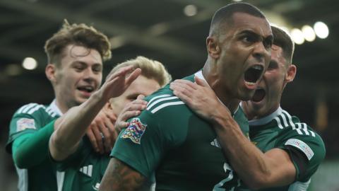 Josh Magennis celebrates his goal