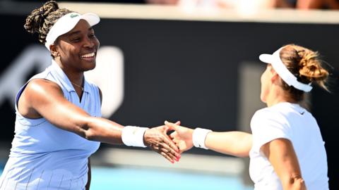 Venus Williams shakes hands with Tatjana Maria after their match at the Hobart International