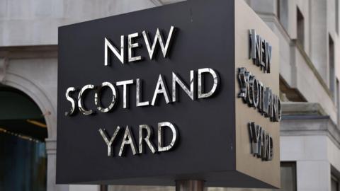 File image of the New Scotland Yard sign in London.