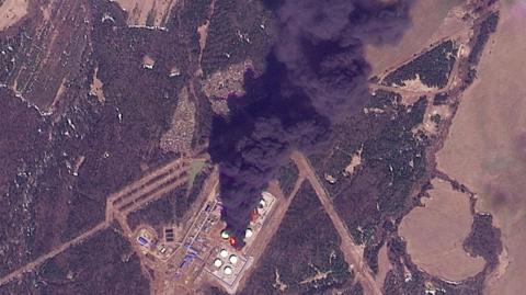 A satellite image shows smoke rising following a Ukrainian drone attack on an oil pumping station
