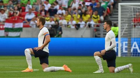 England players take the knee