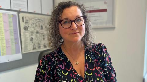 Council leader Nadine Peatfield sat behind a desk in her office.