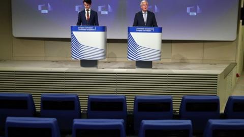 EU Brexit negotiator Michel Barnier, right, speaks following the third round of Brexit talks