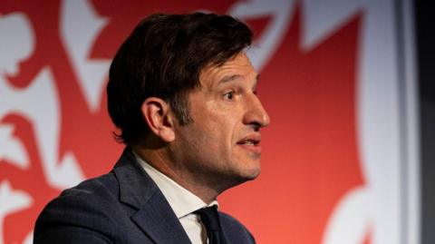 Noel Mooney speaks at a coaching conference 