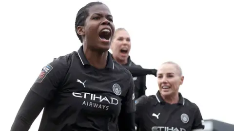 Khadija Shaw celebrates