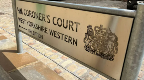 Image of the sign outside Bradford Coroner's Court 