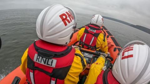 Staithes and Runswick Bay volunteers in lifeboat heading out towards Kettleness