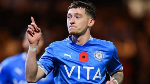 Louie Barry celebrates the first of his two goals against Reading.