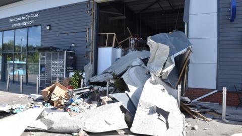 The front of the shop is damaged