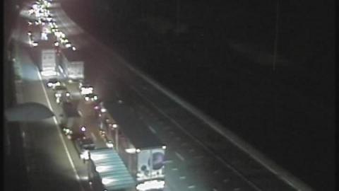 A traffic camera image of traffic queued on the M25.