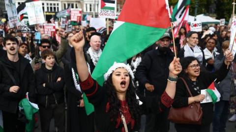 Protesters march during a pro-Palestinians demonstration to mark the first anniversary of the war in Gaza on October 05, 2024 in Edinburgh, Scotland.