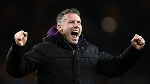 Rob Edwards celebrates win over Liverpool