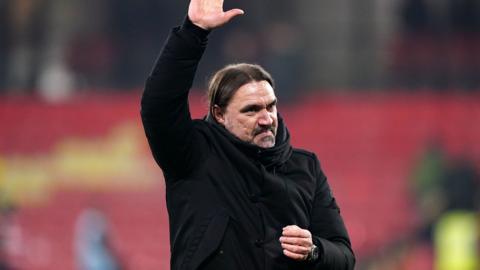 Leeds manager Daniel Farke waves to the away fans at Vicarage Road