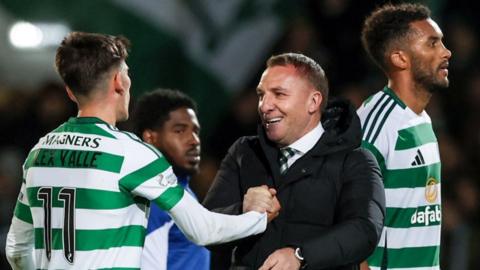 Celtic manager Brendan Rodgers celebrates with Alex Valle