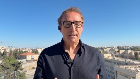The BBC's Sebastian Usher addresses the camera in Jerusalem