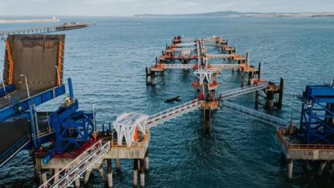 Empty berths at Holyhead port, showing the lattice girders which were damaged in a recent storm 