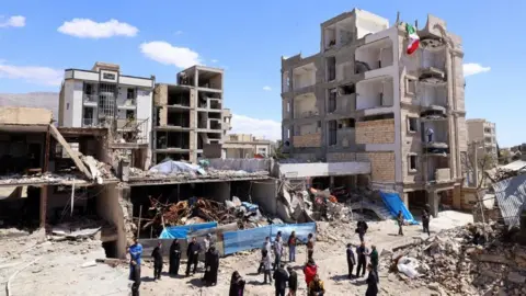 A view of damaged residential buildings after an airstrike on the city of Karaj, Alborz Province, Iran, 03 April 2026. 