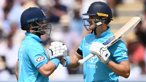 England openers Ben Duckett (left) and Jacob Bethell (right) clasp hands