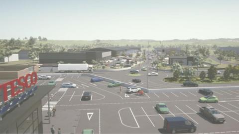 A graphic design plan of the new retail park. It shows a Tesco store in the bottom left corner and a car park fills up most of the image. Multiple cars are parked in spaces. Industrial units are in the distance. 