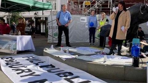 Families protesting in Hereford City Centre