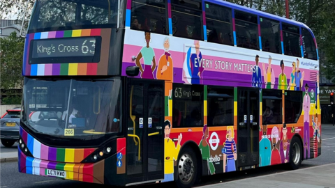 Rainbow-coloured 63 bus