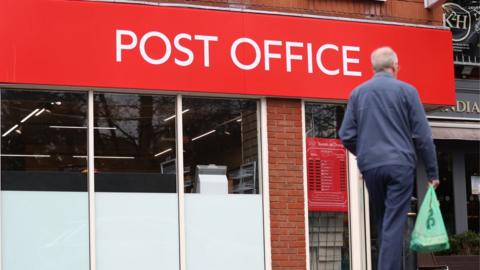 The logo of the Post Office is displayed outside one of its branches on 8 January 2024 in Sandbach, United Kingdom