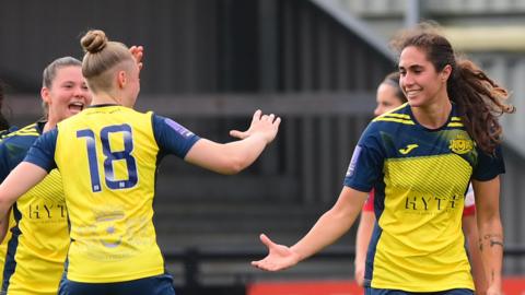 Moneyfields FC Women celebrate a goal against Exeter City