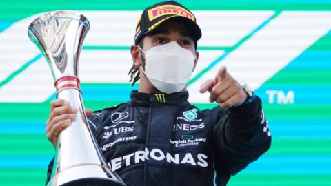 Lewis Hamilton celebrates winning the Spanish Grand Prix