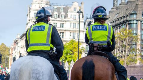 Met officers on horseback as they watch over demonstration in London