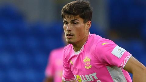 Ronnie Edwards playing for Southampton against Cardiff City in the Carabao Cup earlier this season