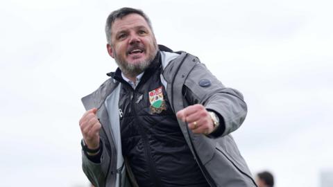 Barnet manager Dean Brennan celebrates