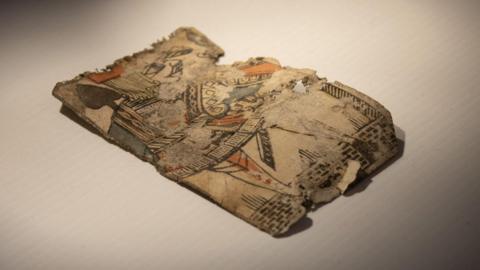 The Jack of Spades was discovered under the floorboards of the Commissioner's House during its restoration. Three of its corners were cut off in uneven angles.