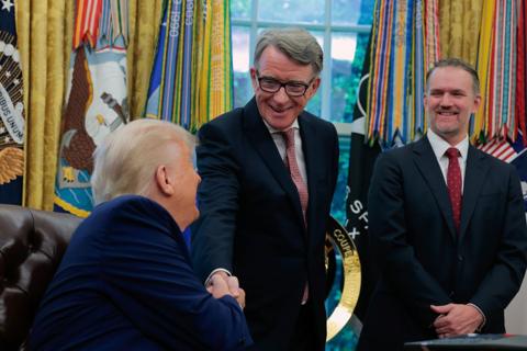 President Donald Trump shakes hands with Peter Mandelson, British Ambassador to the United States