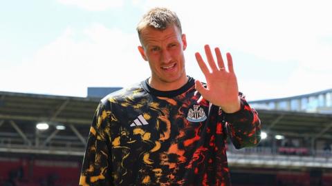 Dan Burn smiles for a camera