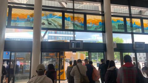 Stained glass windows at a bus station