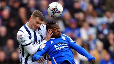 West Brom's Conor Townsend challenges Leicester's Abdul Fatawu