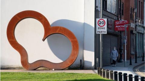 Street scene with stylised heart sculpture, Merthyr Tydfil