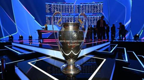 Champions League trophy at the draw