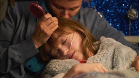 Sharon Horgan and Niamh Moriarty resting in bed, in a scene from 鶹Լ One's Best Interests