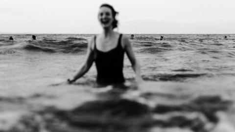 A smiling woman in the sea