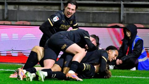 Plymouth Argyle players celebrate